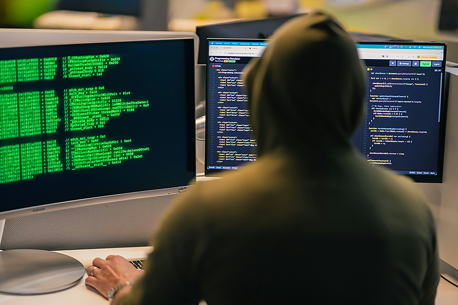 Cybersecurity analyst at workstation
