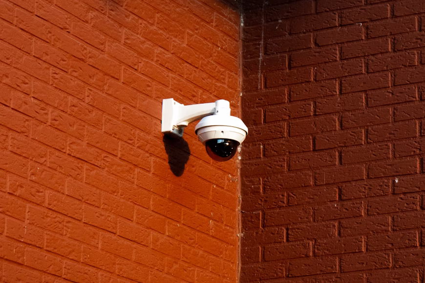 Outdoor dome security camera demonstrating traditional single-direction monitoring.