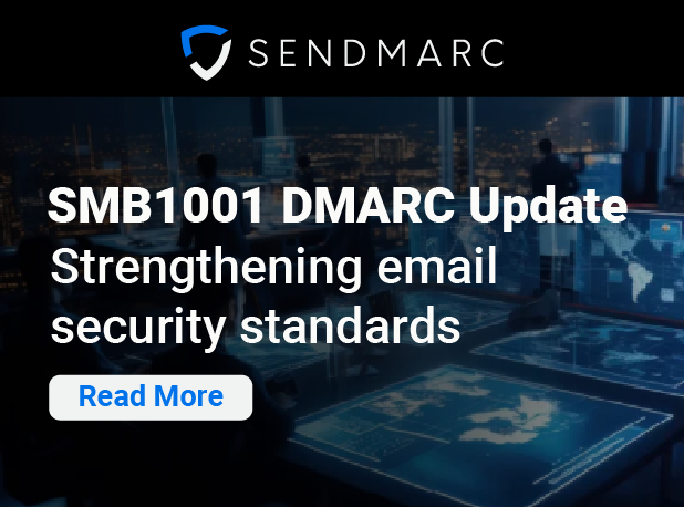 Sendmarc banner showing a dark control-room background with digital world maps on large screens. Text reads: ‘SMB1001 DMARC Update – Strengthening email security standards.’ A blue ‘Read More’ button is displayed below.