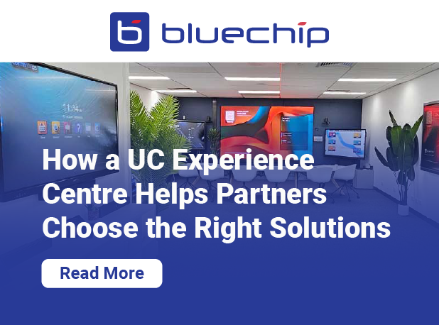 A close-up of a person's hand interacting with a touchscreen interface displaying the words "How a UC Experience Centre Helps Partners Choose the Right Solutions" and "Read More" against a bluechip-patterned background.