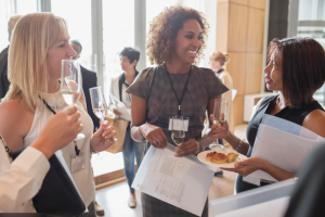 Resellers discussing IT hardware planning at a networking event