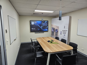 QLD UC Experience Centre meeting room with unified communications setup